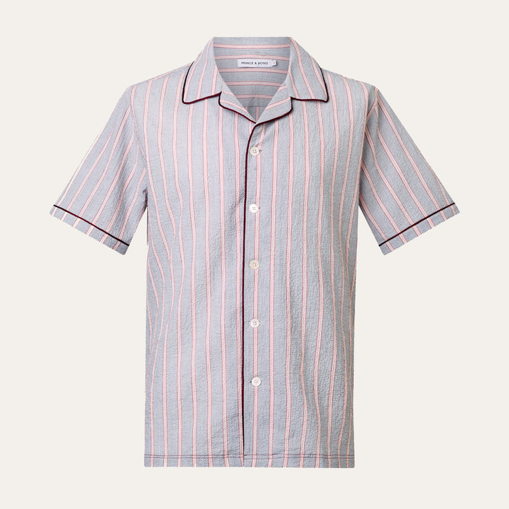 Luka Grey Shirt with Burgundy PipingCut from a breathable cotton seersucker fabric, the Luka  shirt is Inspired by the classic cuban shirt. Designed with a camp collar and burgundy contrasting piping.