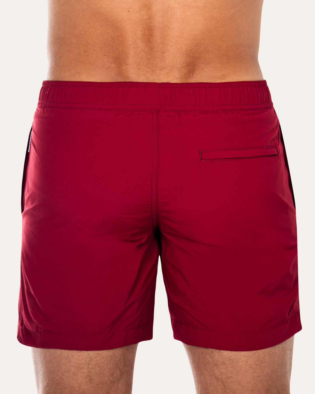 Easton Burgundy Mens Swim ShortsCut in a tailored silhouette and designed with an elasticated waistband, our mid-length Easton swim short  is our refined take on the classic swim shorts.
 Featuring