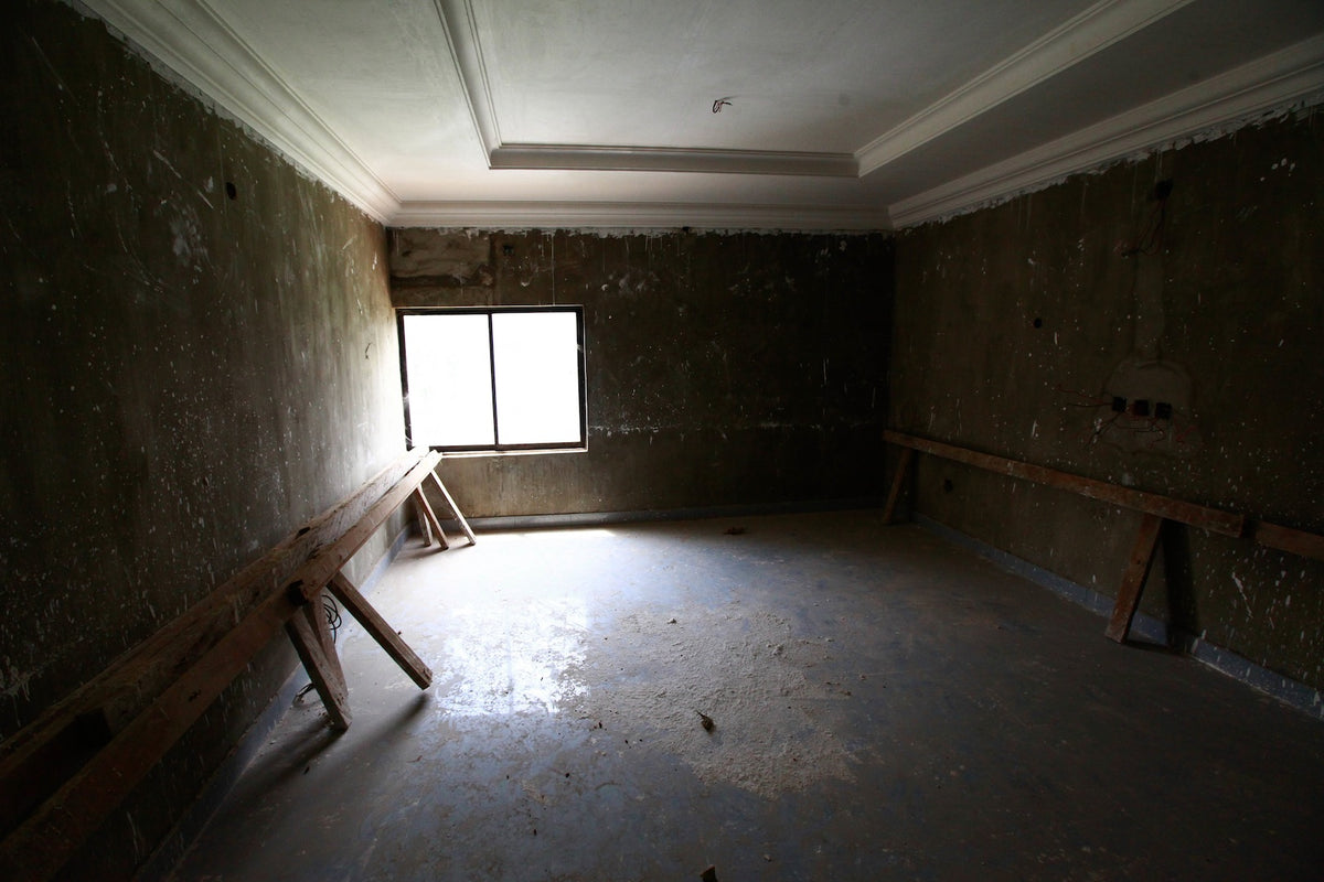 The unfinished hotel and existing blue stone floor that began the Prince & Bond design story