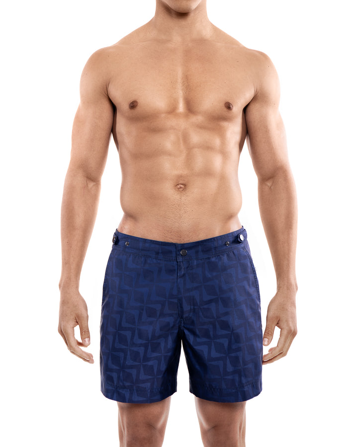 Elvio Deep Sea II Swim Short
Cut in our signature Elvio silhouette, our hybrid swim shorts are made from quick drying and breathable shell and printed in a blue geometric pattern.




An elevatswim shorts
