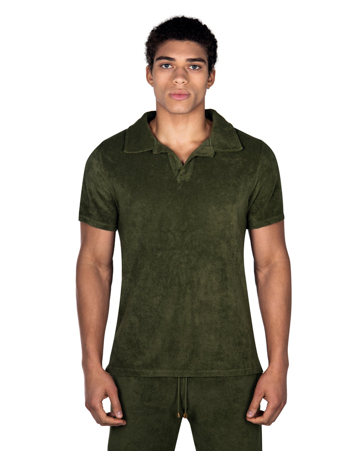 Riviera Terry Polo  
Cut from  organic terry toweling fabric that is soft and highly breathable, our Riviera polo is designed with an open placket which exudes effortless cool.
An Ide