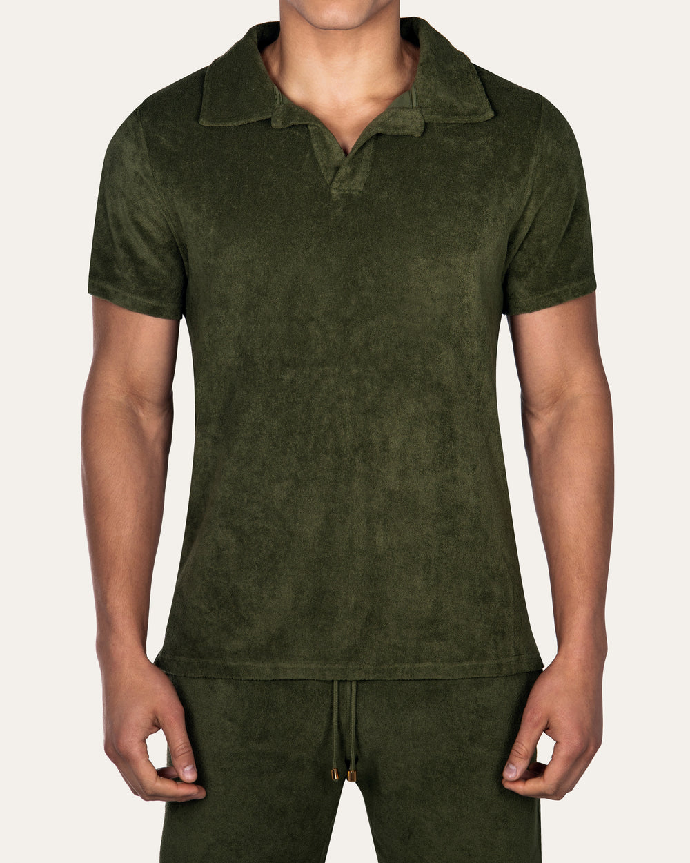 Riviera Terry Polo  
Cut from  organic terry toweling fabric that is soft and highly breathable, our Riviera polo is designed with an open placket which exudes effortless cool.
An Ide