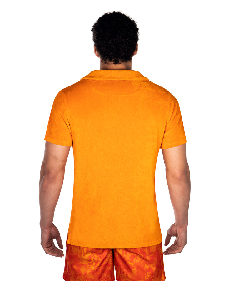 Riviera Terry Polo
  
Cut from  organic terry toweling fabric that is soft and highly breathable, our Riviera polo is designed with an open placket which exudes effortless cool.
An Id