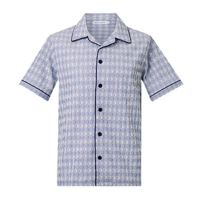 Luka Blue Camp Collar ShirtCut from a breathable cotton seersucker fabric, the Luka  shirt is Inspired by the classic cuban shirt. Designed with a camp collar and a contrasting piping detail, 