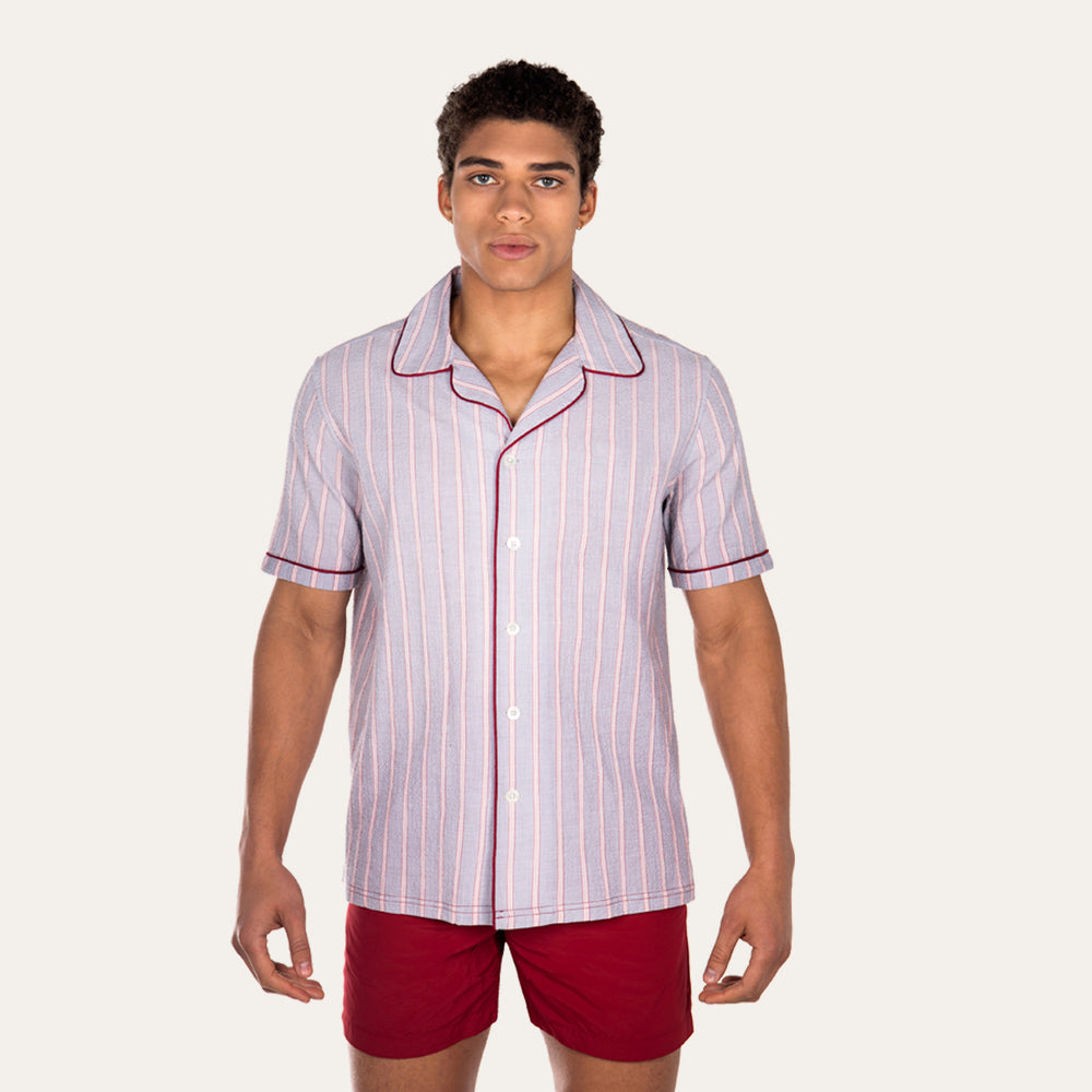 Luka Grey Shirt with Burgundy PipingCut from a breathable cotton seersucker fabric, the Luka  shirt is Inspired by the classic cuban shirt. Designed with a camp collar and burgundy contrasting piping. 