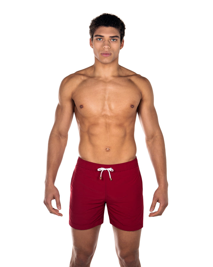 Easton Burgundy Mens Swim ShortsCut in a tailored silhouette and designed with an elasticated waistband, our mid-length Easton swim short  is our refined take on the classic swim shorts.
 Featuring