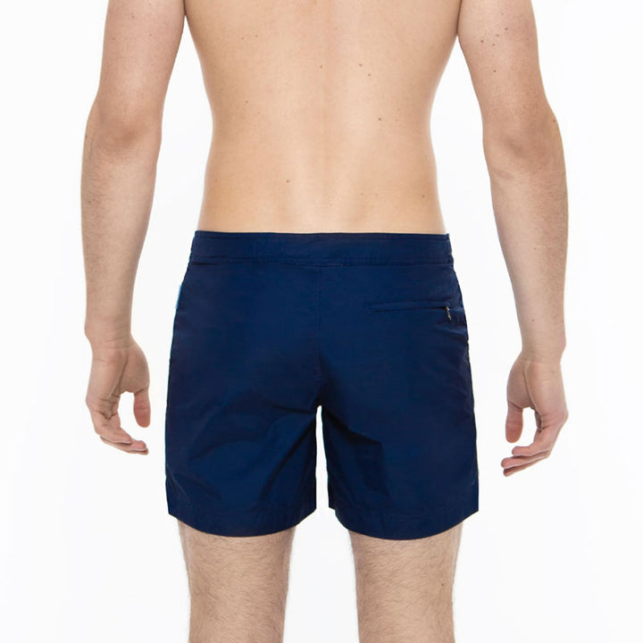 Elvio Blue Tailored Deep Sea Swim ShortCut in our signature Elvio silhouette, these hybrid swim shorts are made from quick drying breathable shell. 
An elevated take on the classic swim shorts, they featuswim shorts